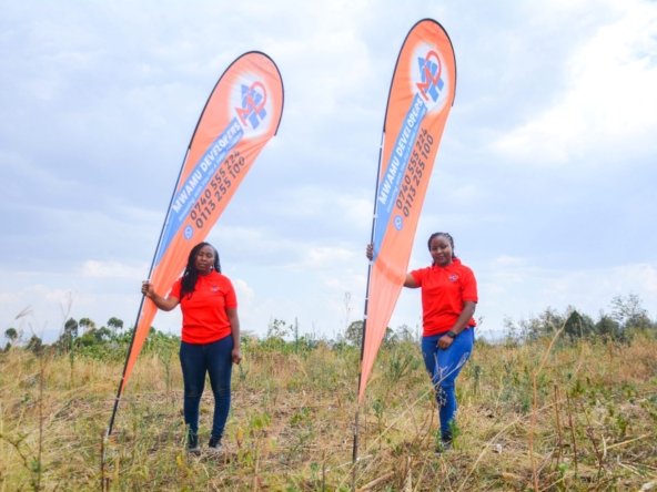 Mwamu Developers team showcasing prime 50x100 plots for sale in Njoro Bagaria Nakuru County